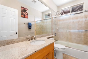 Guest bedrooms share a guest bath.