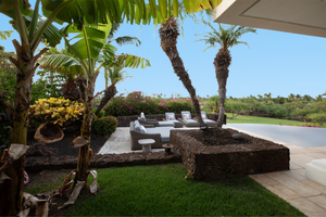 Enjoy your morning coffee or sunset cocktails in this quiet garden nook with peekaboo ocean views.