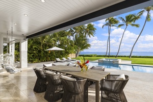 Spacious lanai with covered dining and ocean views, ideal for sunset meals and morning coffee.