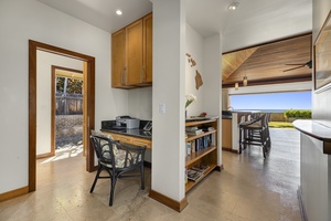 Dedicated work station with built-in desk and convenient location between common areas.