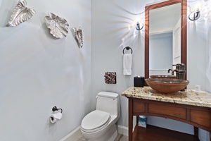 The convenient powder room at Wailea Hoolei 93-3 is just off the main living space.