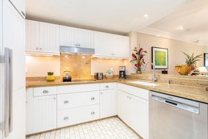 Large kitchen with stainless steel appliances