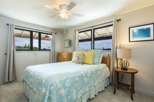 Bedroom two, with queen bed and shared bath.