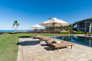 Gather under umbrellas for breezy afternoons overlooking Pauoa Bay.