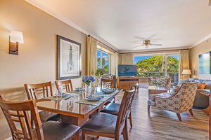 Dine in elegance in this well-lit dining area with seating for six.