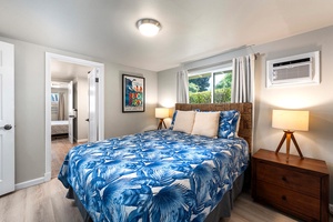 Another angle of the guest bedroom showcasing comfort and style.