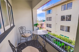 Enjoy your morning coffee on guest room 1's private patio with garden views.