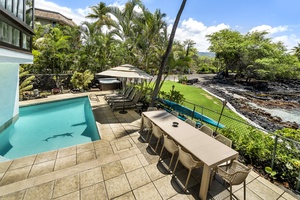 View of the pool area from the stairs leading to the second and third floor