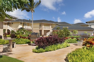 Beautifully landscaped grounds with barbecue areas perfect for casual outdoor dining.