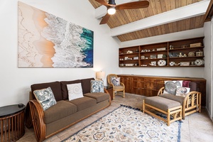 Unwind in a relaxed living space, where vaulted ceilings and soft textures invite you in.