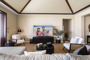 Catch your favorite shows or movie nights in the media lounge with a 75” smart TV and cozy seating.