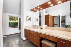 Double vanity with ample counter space and natural light—perfect for couples or longer stays.
