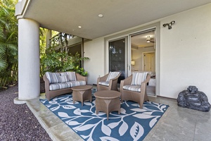 Relax on the private lanai of the second bedroom at Wailea Hoolei 93-3 with a cool drink in hand.