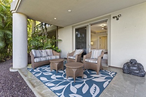 Relax on the second bedroom's lanai with a cool drink.