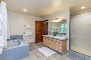 Ensuite has dual sinks and a soaking tub