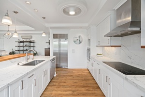 Spacious kitchen area for your meal prep with top-tiered appliances.