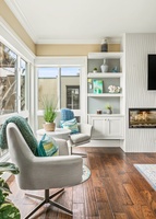 Enjoy a peaceful reading corner with natural light and stunning ocean views.