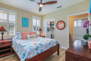 The two additional bedrooms feature Queen-size beds and are connected with their own vanities, and a shared toilet and bath between them