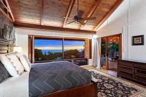Enjoy sunset skies right from your cozy bed in the primary bedroom.
