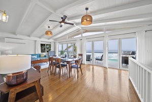 Inviting communal space with vaulted ceilings and ocean views, giving guests a true North Shore indoor–outdoor living experience.