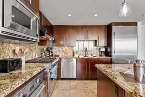 Cook with ease at Honua Kai Hokulani 825, with modern appliances and granite countertops.