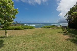 Grand back yard with private beach access (seasonal, due to high tides).