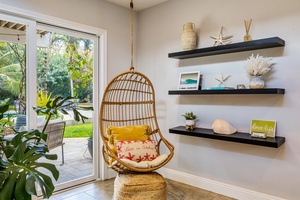 Relax with a book or morning coffee in the charming hanging chair nook.