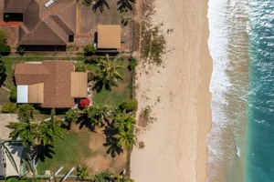 Indulge in the serene allure of the sea at this beachfront haven, where waves whisper the timeless tales of tranquility.