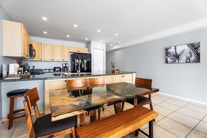 Dining area seats six and opens directly to the kitchen and living space—perfect for group meals or game nights.