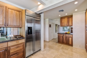 The spacious kitchen area has plenty of storage options.