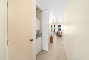 Hallway with in-unit washer/dryer