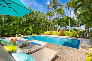 Unwind by your private pool surrounded by lush tropical gardens