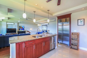 Wide countertops with plenty of cabinets for storage and clutter free culinary space.