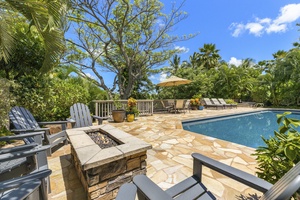 Poolside fire pit where to gather with friends at night