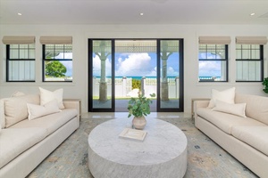 Seamless indoor-outdoor flow with views that invite you to the beachfront lanai.