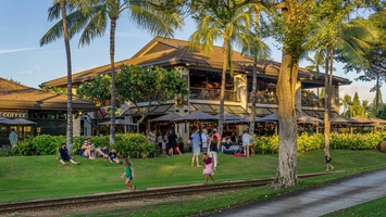 Dine at Monkeypod Kitchen, a local favorite known for sunset cocktails and island-inspired eats.
