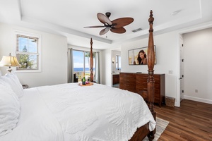 The primary suite has a king-sized bed, AC, TV, and private lanai with stunning ocean views.