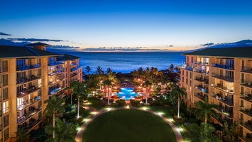 Sunset paints the sky behind Honua Kai Konea 204—perfect for evening walks and oceanview dining.