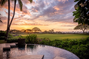 The majestic Hawaiian sunset from this exquisite estate's private spa.