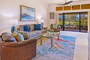 Kick back in the spacious living area at Kapalua Ridge 2321, with cozy furnishings and lanai access.