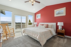 Step into an exquisite embrace as the master bedroom welcomes you with tall window panes, offering captivating views and invigorating natural lighting.