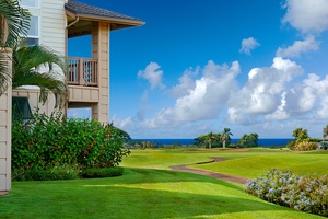 Lush garden views and serene green fairways just outside your windows — tropical surroundings await.