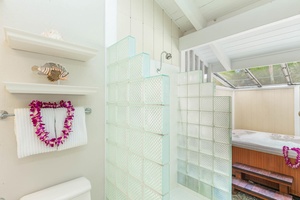 Tiled shower in the primary creates a spa look and feel