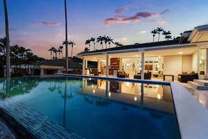 Framed by sunset hues, the pool becomes a front-row seat to paradise.