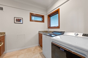 A dedicated laundry space adds comfort and convenience for longer island stays.