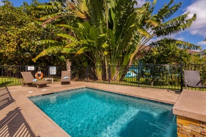 Private pool at Pohaku Villa, surrounded by lush greenery and perfect for a refreshing dip.