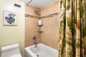 Bathroom includes a tub—perfect for a relaxing soak after the beach.