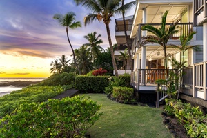 Hale Kai O’Kona grounds with lush landscaping at golden hour.