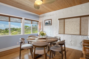 This stylish dining nook is perfect for casual breakfasts or work-from-home mornings, featuring custom textures and warm finishes.