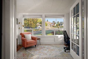 Catch up on work or unwind with coffee beside large windows and neighborhood views.
